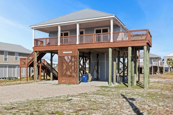4BR coastal home with a hot tub & ocean-view deck—steps from the beach