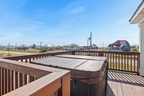 Relax in this serene hot tub with privacy & stunning views—your perfect retreat.