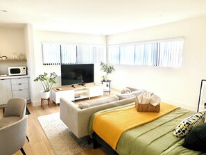 Sunlit guesthouse with many south and east facing windows.