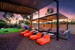Experience movie night like never before with our backyard theater, where comfort meets the outdoors.
