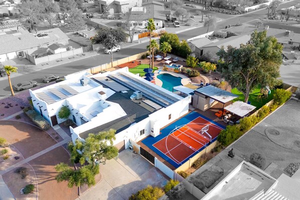 Take in the breathtaking aerial view of our stunning property, complete with all the luxurious amenities you need for the perfect getaway.