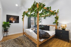One King bed in the Bedroom. Cozy seat for relaxing, Full length mirror, Closet with hangers and shelf, Nightstands to store your items in.