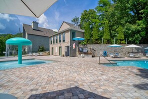 Enjoy sunny days by the pool with plenty of loungers, umbrellas for shade, and a splash zone perfect for kids to cool off.