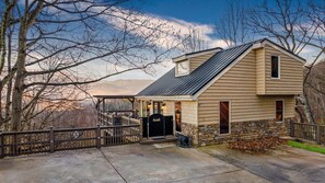 Welcome to your peaceful mountaintop retreat—where charm meets sweeping Smoky Mountain views from the moment you arrive.