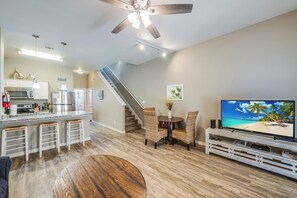Relax in the living space and enjoy the entertainment center with flat-screen TV and streaming services