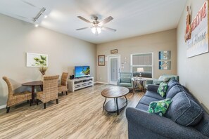 Relax in the living space and enjoy the entertainment center with flat-screen TV and streaming services