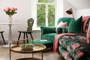 The Hayloft, Kailzie - comfortable two-seater sofa and armchair with matching footstool