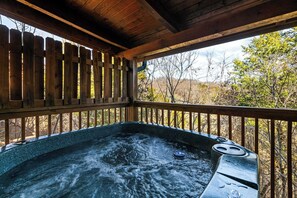 Relax and unwind in the private hot tub
