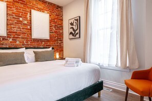 Elegant king bedroom in Unit 2, separated by beautiful French doors for privacy. Perfect for visitors attending the Stratford Shakespeare Festival, enjoying the performing arts venues, or strolling along the Avon River. This vacation rental offers a blend