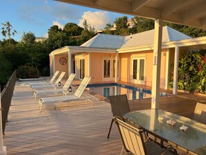 Chaise loungers for sun or shade with bedroom ensuites behind