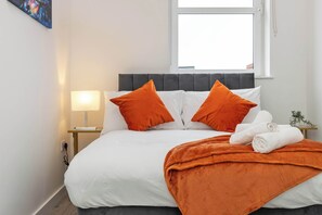 Stylish and modern bedroom with comfy hotel mattress