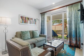 Cozy Living area has access to the private balcony