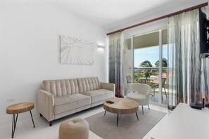 Wake up to stunning pool views from the comfort of your cozy bed - Floor-to-ceiling windows fill the room with natural light and a refreshing ambiance - The perfect spot to relax and recharge with soft linens and peaceful surroundings