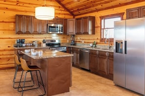 A full kitchen with all the essentials to enjoy your stay. From your morning coffee to cooking and grilling dinner and enjoying an evening glass of wine, we have everything you need to make your vacation perfect.