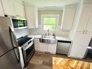 Stainless appliances, toaster, coffee maker provided