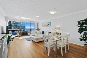 The spacious dining area offers seating for six and seamlessly blends with the open-plan living and kitchen space.