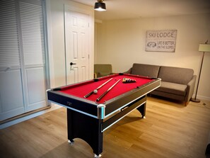 Pool table in the basement gameroom