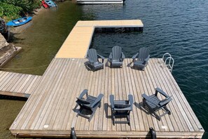 Spacious dock and seating area on the lake
