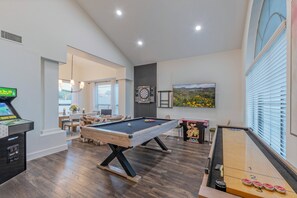 Choices in the game room include pool, video and table games, shuffleboard, darts and TV viewing.