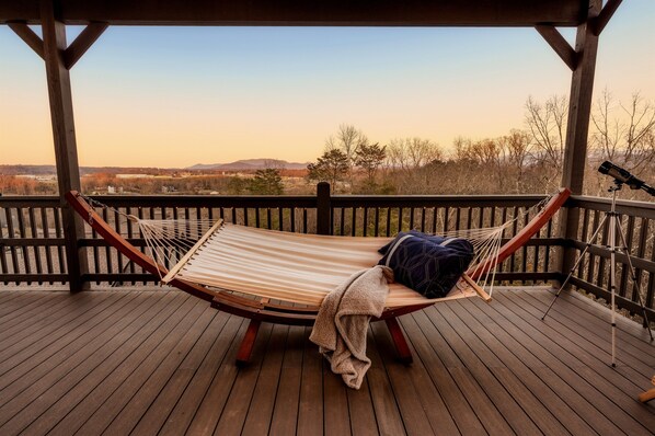 Get cozy in this hammock on the third floor Skydeck with relaxing mountain views!