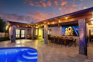 Dinner & a movie—backyard edition! Enjoy delicious meals under the stars, then kick back for a movie night on the outdoor projector!