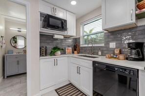 The kitchen is fully equipped with everything you need for a comfortable stay, whether you're visiting for a few nights or an extended stay.