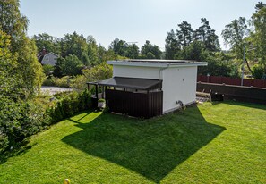 Picture of the house from the back, entrance and terrace are on the other side