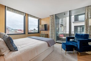 The main bedroom with great ocean and city views