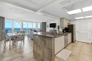 The fully equipped kitchen features granite countertops, stainless-steel appliances, and has everything you need to prepare meals for family & friends.