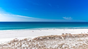 Endless Gulf views and sugar-white sand – just steps from your private retreat.