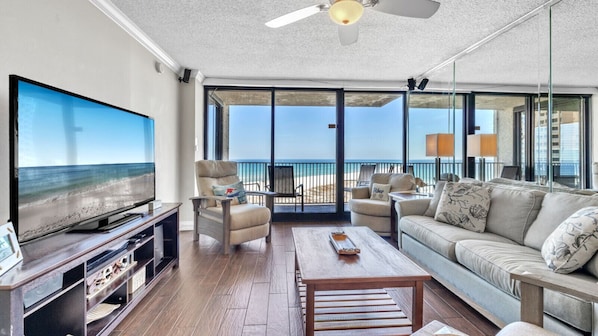 Cozy coastal living with stunning Gulf views. Relax in plush seating, enjoy the large TV, or step onto the balcony to soak in the beach breeze.