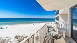 View of the beach and water from the balcony.