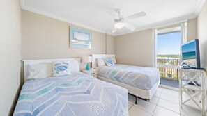 Guest bedroom with two full size beds.