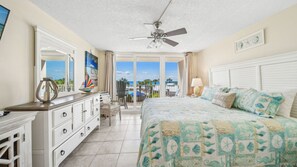 Main bedroom with king size bed, access to the balcony, and fantastic view.