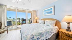 King size bed in main bedroom and balcony access.