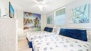 Guest bedroom with two double beds.