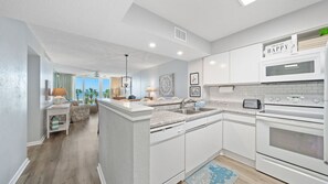Fully equipped kitchen and dining space.