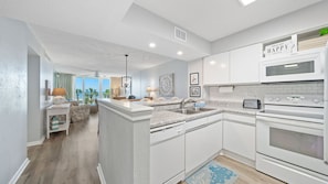 Fully equipped kitchen and dining space.