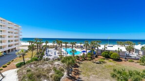 View from the balcony of the beach and pool.