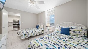 Guest bedroom with two full size beds.