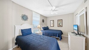 Two full size beds in the second bedroom.
