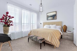 The first bedroom retreat includes a king-sized bed & ensuite bath