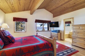 This master king suite showcases a Smart TV & private ensuite