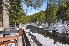 Indulge in this riverfront property
