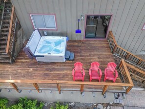 Relax in the hot tub while soaking in an amazing view