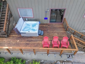 Relax in the hot tub while soaking in an amazing view
