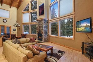 Picture windows allow lots of light into the living room