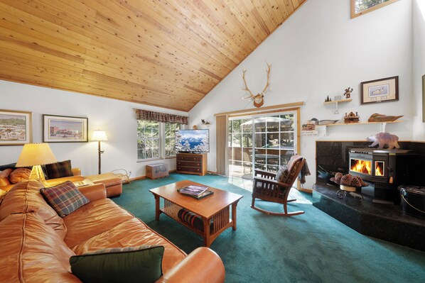 Cozy and spacious living area with TV