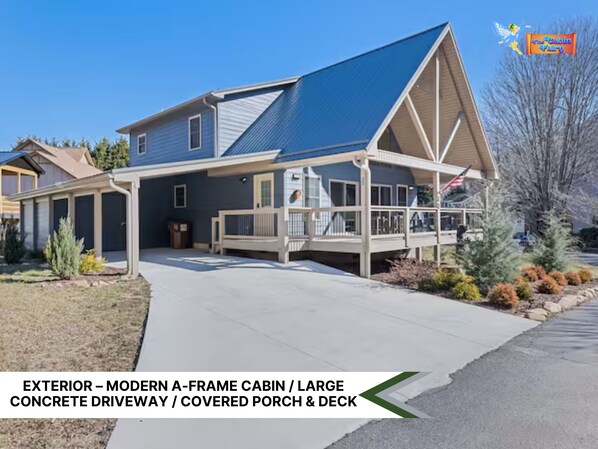 Cozy and inviting cabin with ample parking space and charming porch views.