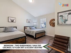 Comfortable bedroom with two cozy beds, perfect for a restful stay.